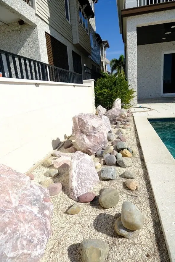 Hardscaping by Living Spaces Gardening Hardscape patio and rock design in Tampa Bay